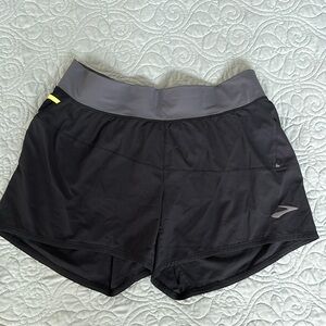 Brooks Run Happy running shorts. Women’s Large.  2 rear + 1 hidden inside pocket